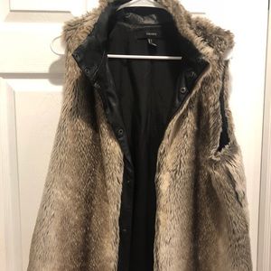 Faux fur vest with faux leather trim